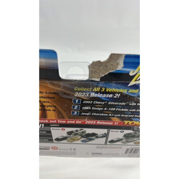 Johnny Lightning 1/64 Tow & go Jeep Cherokee red W/ boat & trailer NIB - Picture 5 of 6